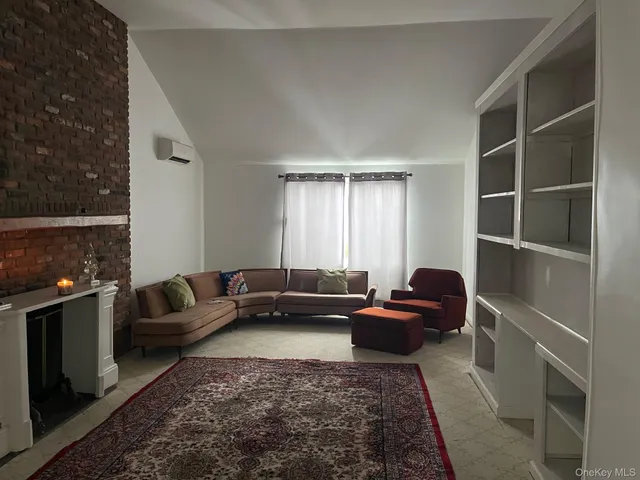 a bathroom with a tub and shower