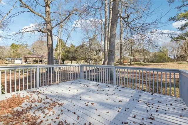 a view of a wooden roof deck