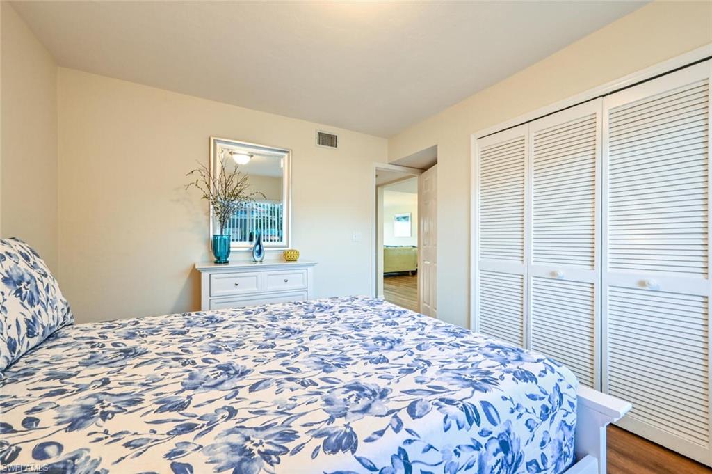 240 Pebble Beach Boulevard, Unit 702 Naples, FL 34113 - Photo 14 of 25 Guest Bedroom