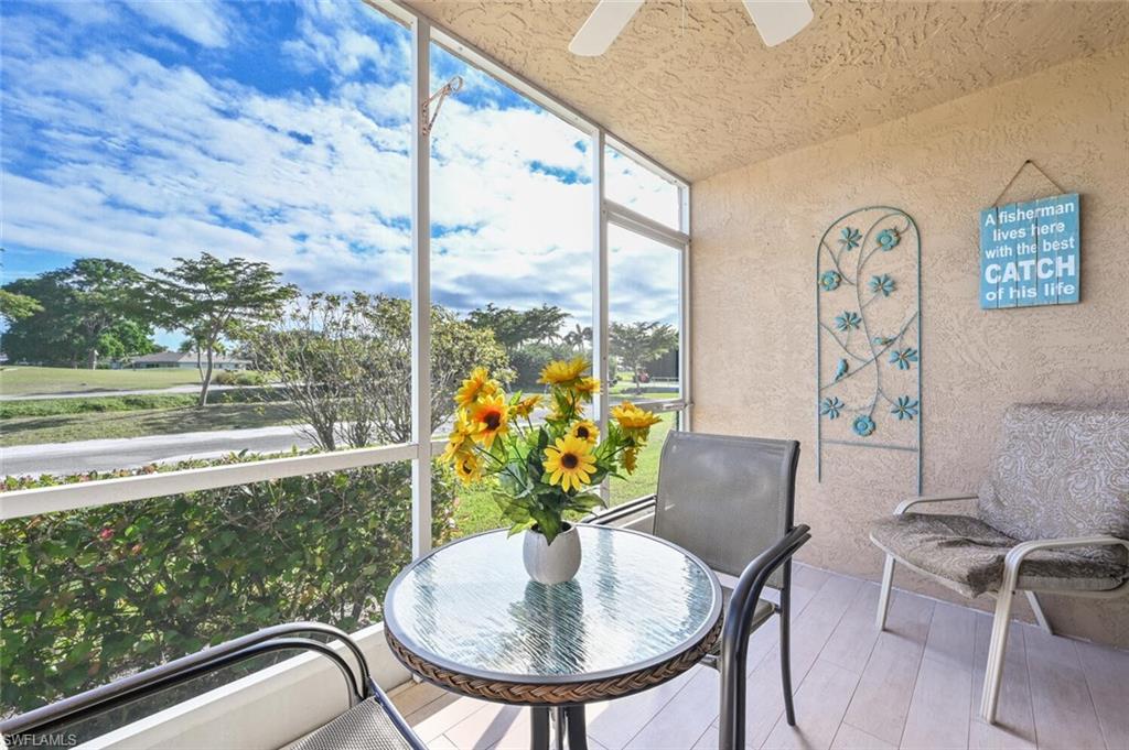 240 Pebble Beach Boulevard, Unit 702 Naples, FL 34113 - Photo 17 of 25 Screened Patio