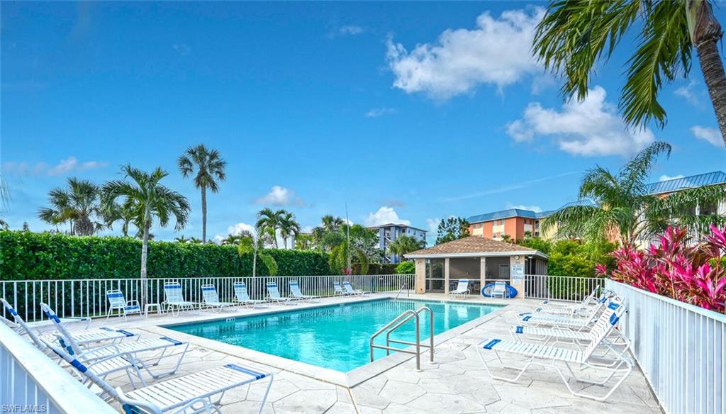 240 Pebble Beach Boulevard, Unit 702 Naples, FL 34113 - Photo 22 of 25 Community Pool