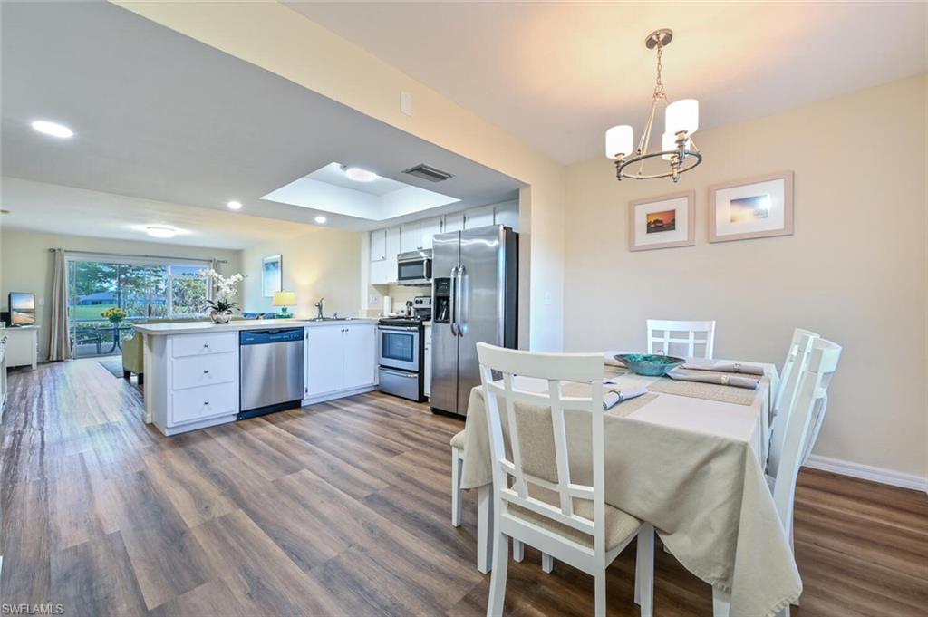 240 Pebble Beach Boulevard, Unit 702 Naples, FL 34113 - Photo 4 of 25 Dining Area