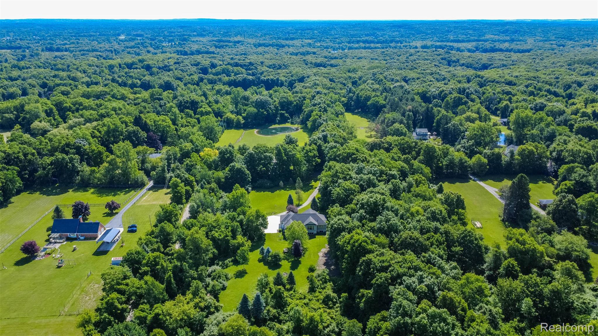 9887 Hadley Road Clarkston, MI 48348 - Photo 50 of 56 Expansive property surrounded by lush, mature trees and open green spaces