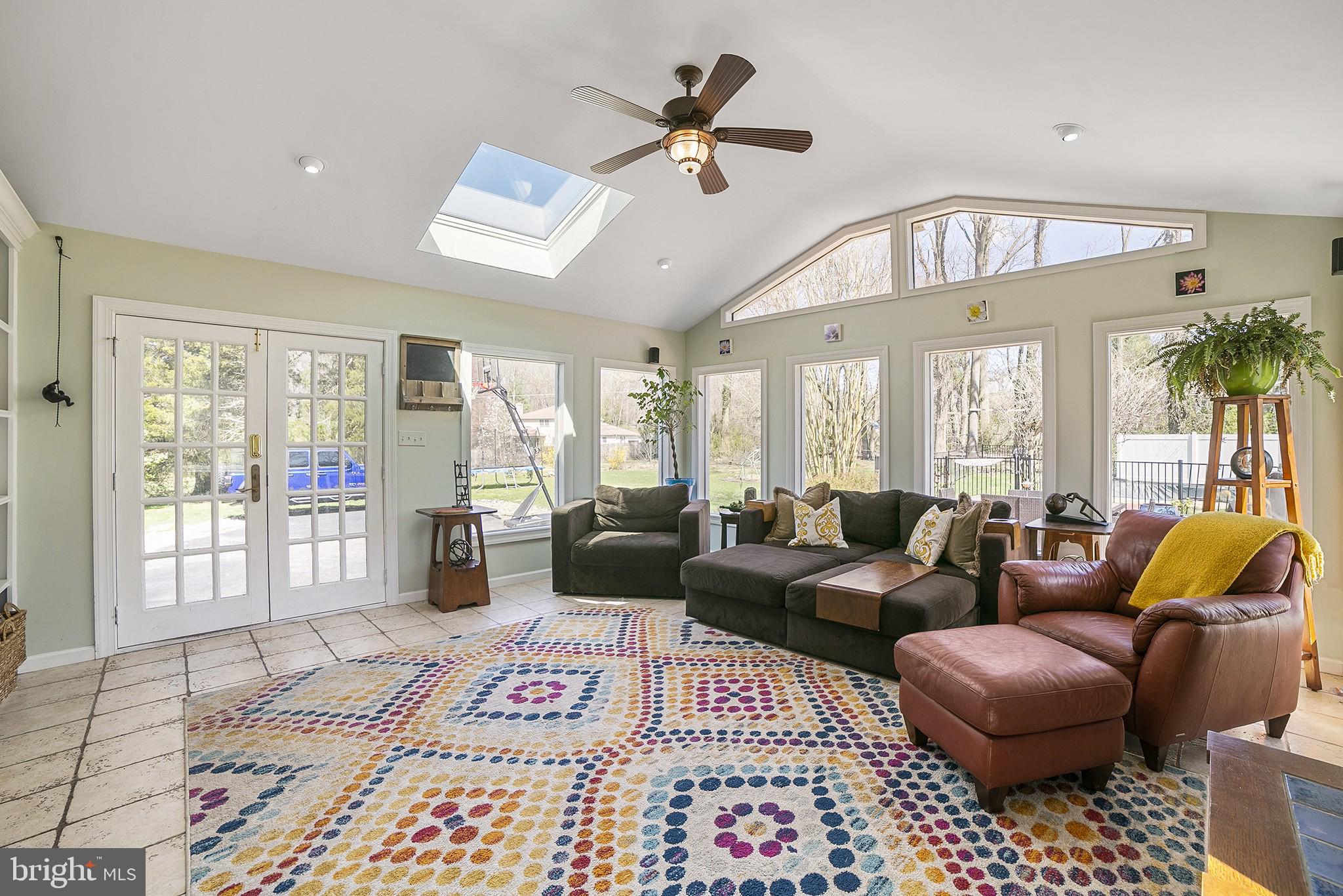 828 Merrill Road Ambler, PA 19002 - Photo 14 of 31 Family room french doors to back yard and pool