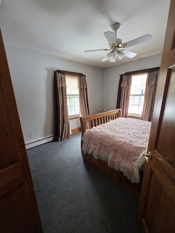 700 Old Fall River Road, Unit 12 Dartmouth, MA 02747 - Photo 26 of 31 a bedroom with a bed and a window