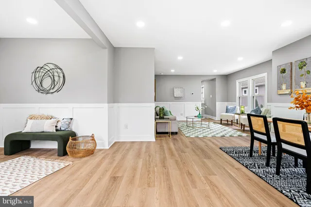 a living room with furniture and a table