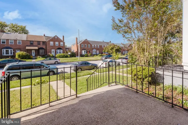 a view of street from balcony