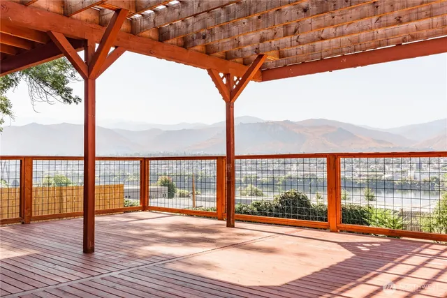 a view of a swimming pool with a yard