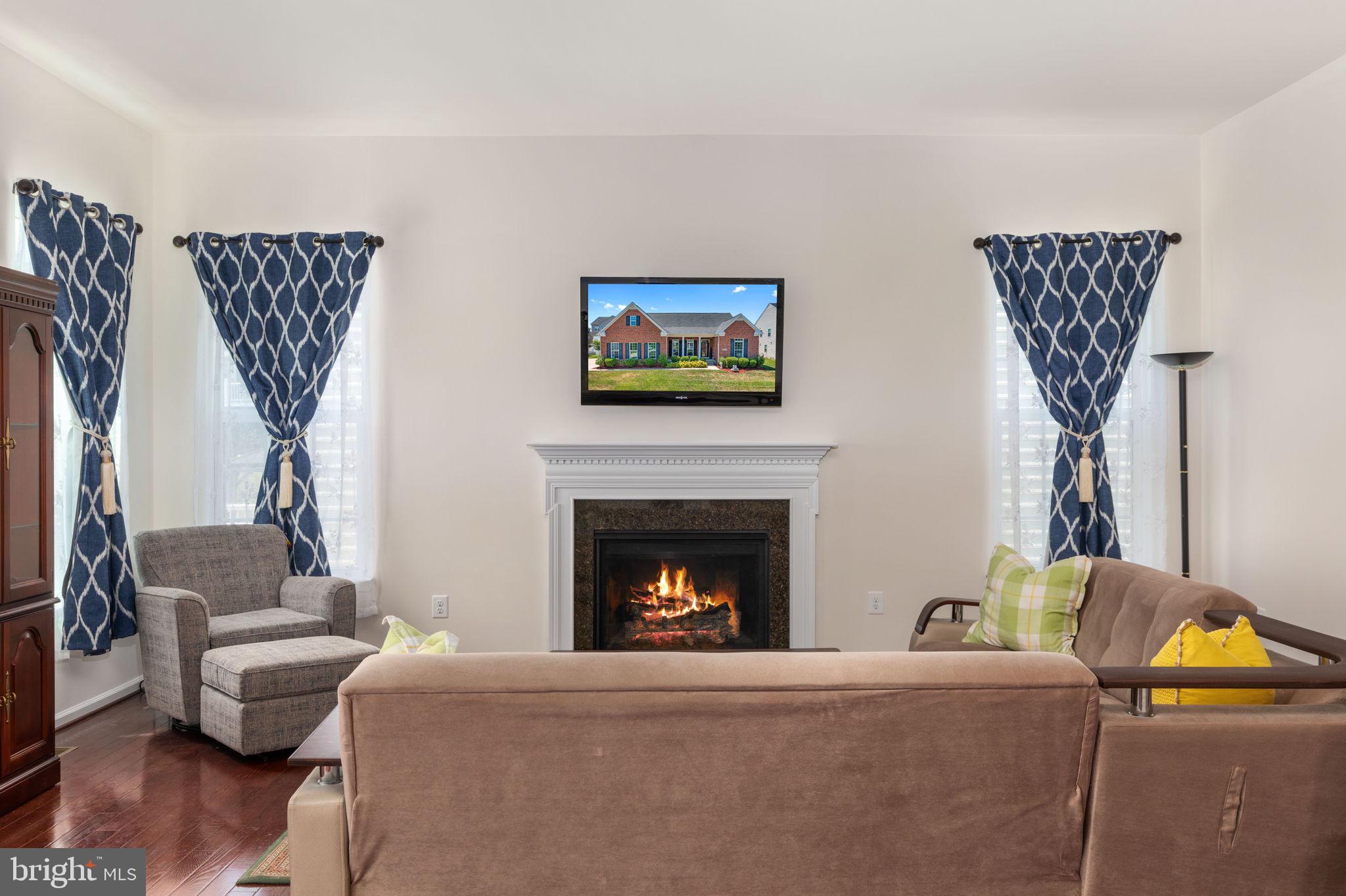 6017 Greenspring Road Fredericksburg, VA 22407 - Photo 19 of 42 Living room with gas fireplace