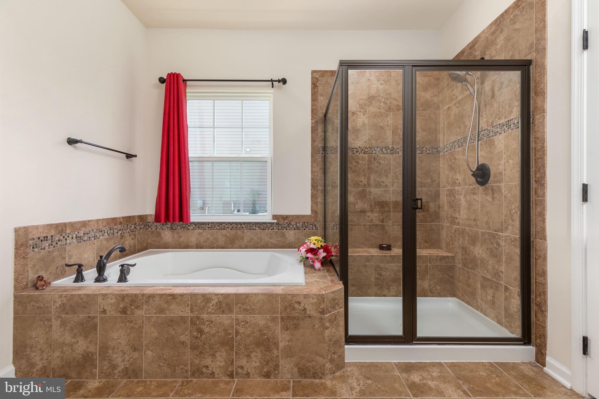 6017 Greenspring Road Fredericksburg, VA 22407 - Photo 28 of 42 Primary bath with shower and soaking tub