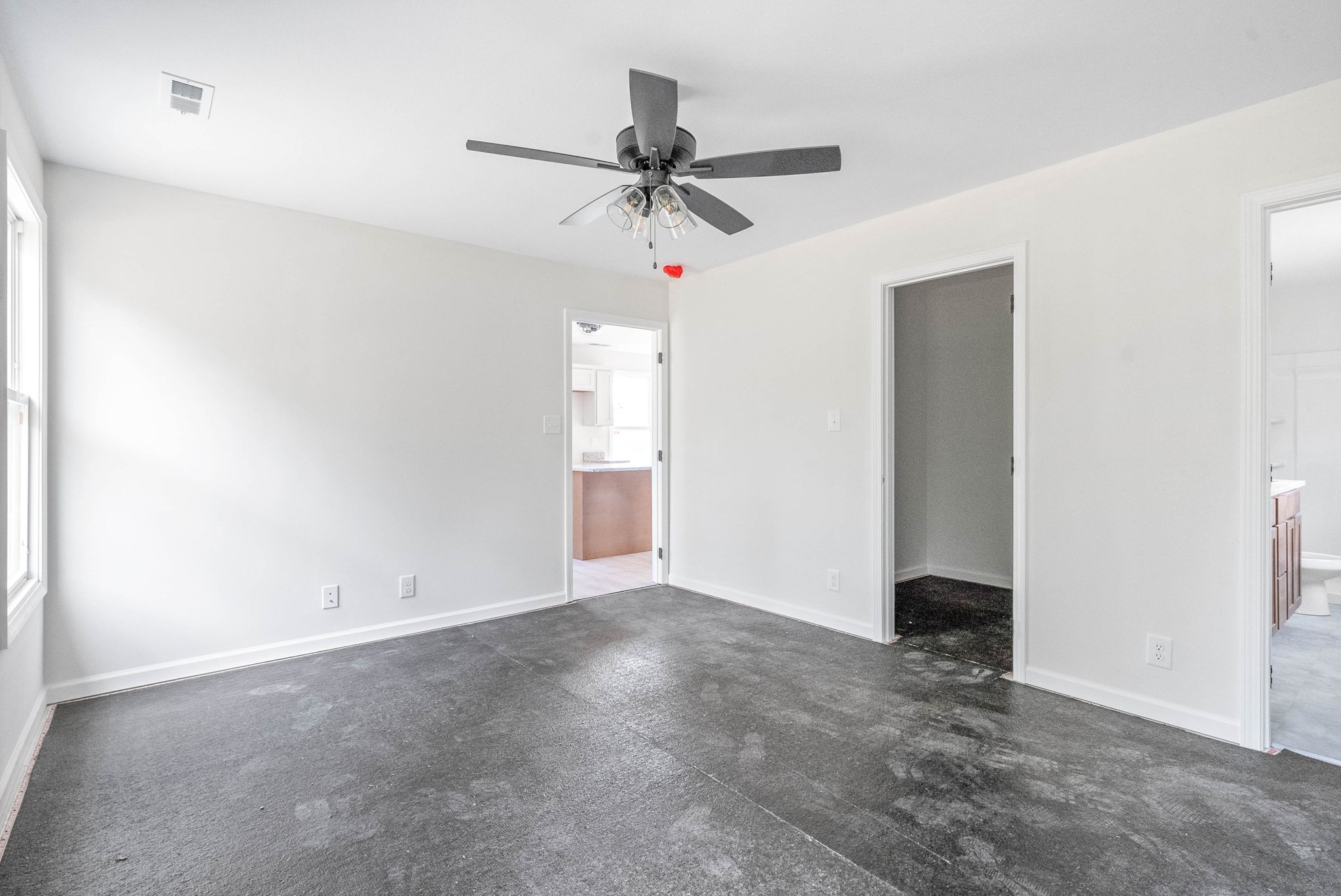 238 Wayne Hall Road Clarksville, TN 37040 - Photo 15 of 26 an empty room with closet and ceiling fan