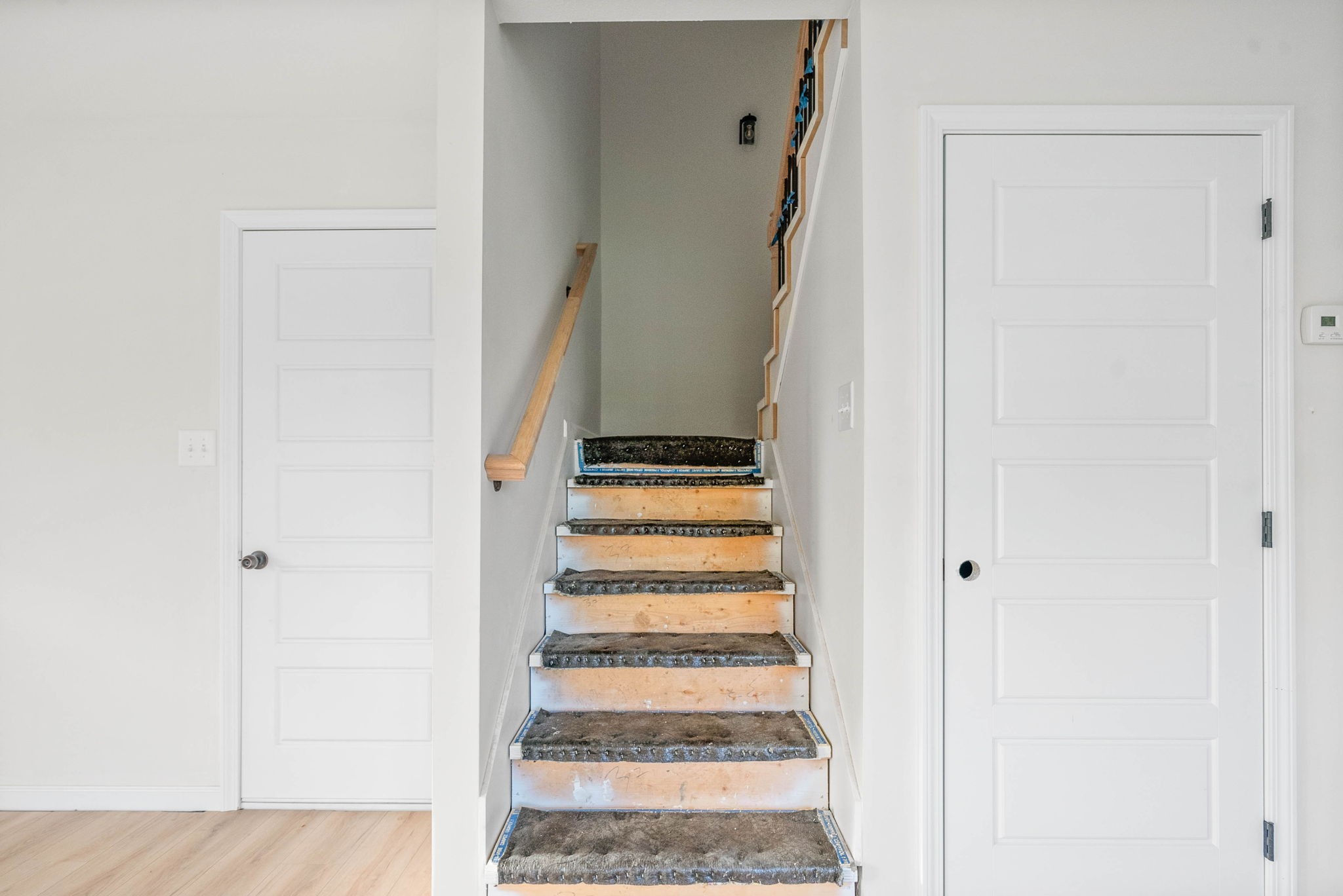 238 Wayne Hall Road Clarksville, TN 37040 - Photo 18 of 26 a view of a staircase with white walls
