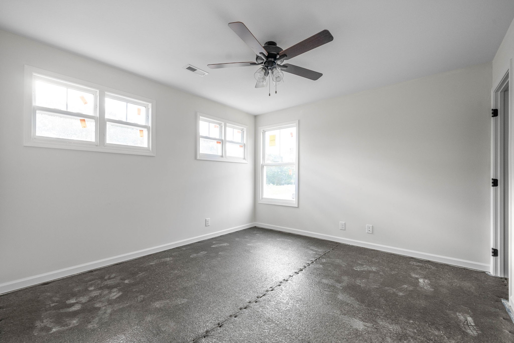 238 Wayne Hall Road Clarksville, TN 37040 - Photo 20 of 26 an empty room with a window and a fan