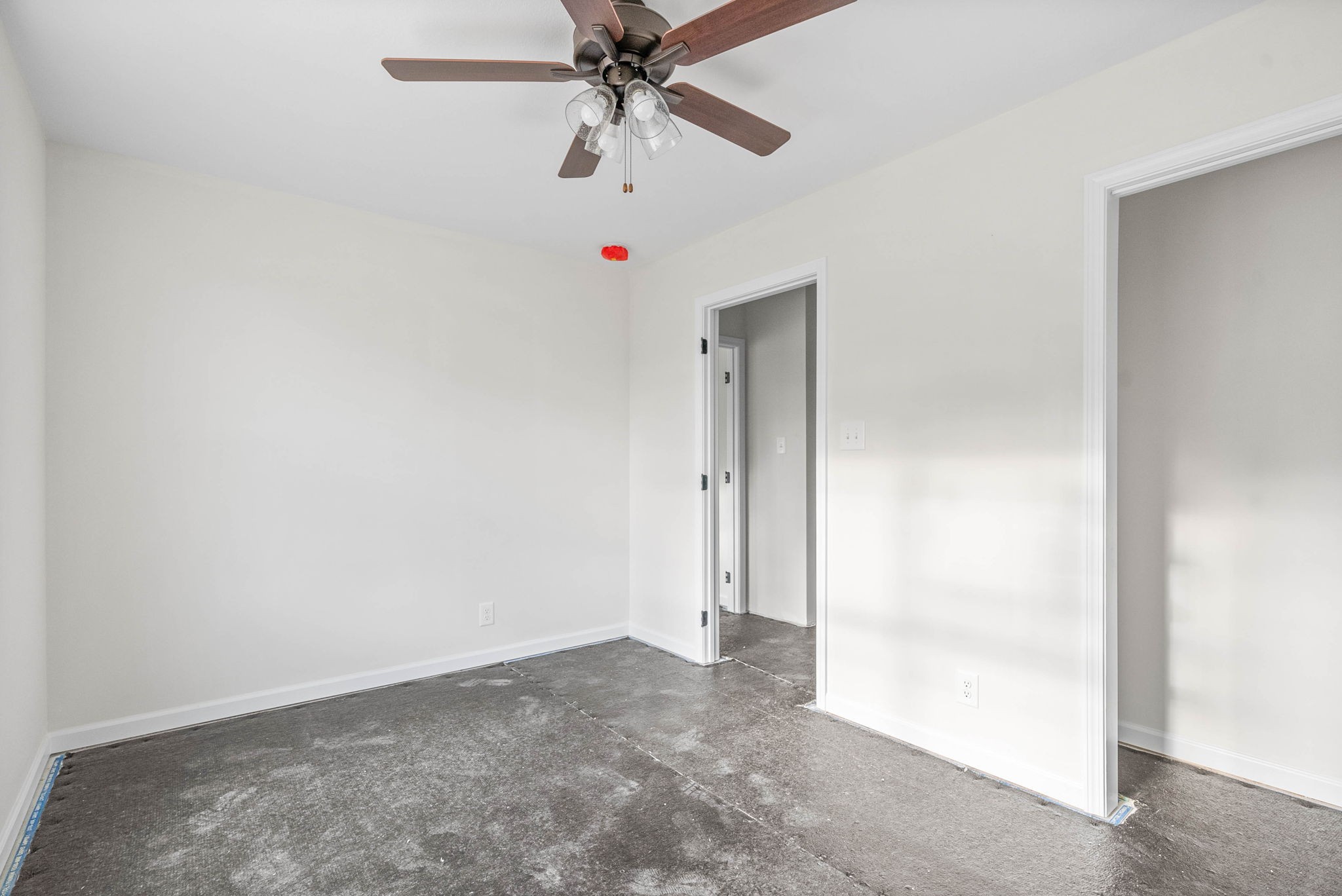 238 Wayne Hall Road Clarksville, TN 37040 - Photo 24 of 26 an empty room with closet and fan