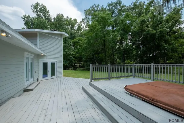a view of a deck with a wooden fence