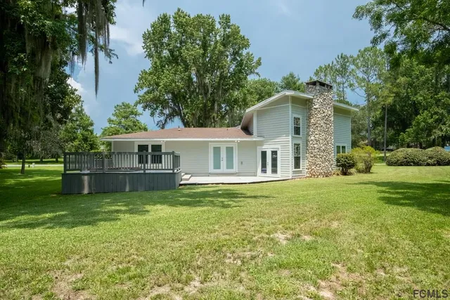 a front view of house with yard and seating area