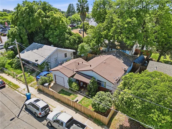 an aerial view of a house with a garden