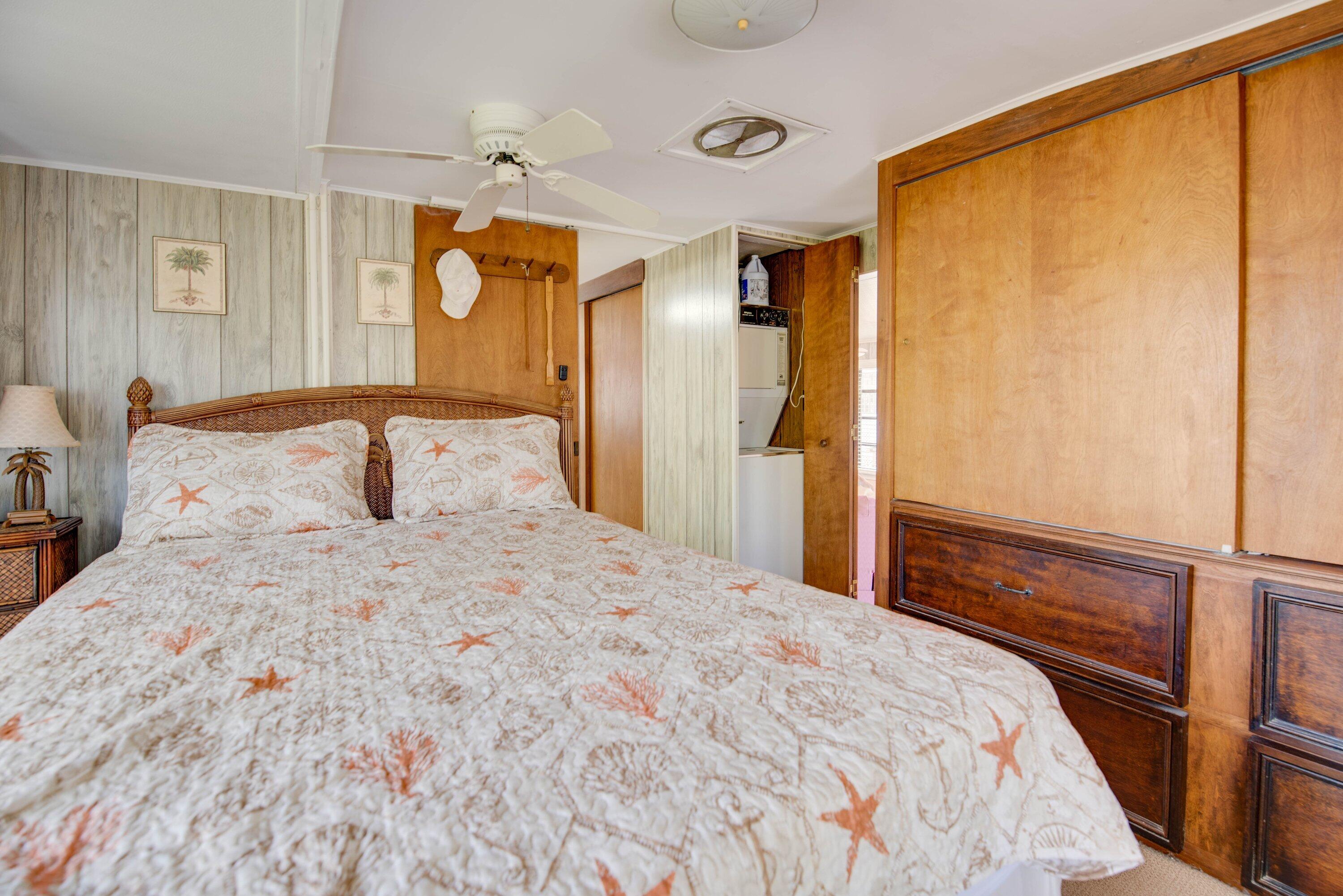 701 Spanish Main Drive, Unit 21 Cudjoe, FL 33042 - Photo 11 of 49 a bedroom with a bed and a window
