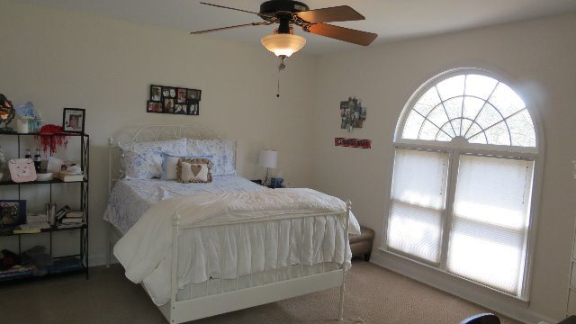 1143 Klopfer Road Macon, GA 31210 - Photo 11 of 19 a bedroom with a bed and a window