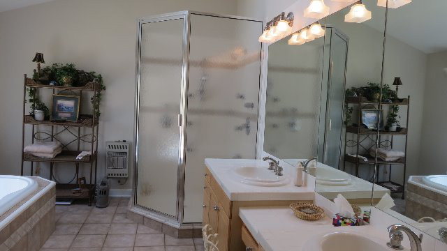 1143 Klopfer Road Macon, GA 31210 - Photo 12 of 19 a bathroom with a sink and a mirror
