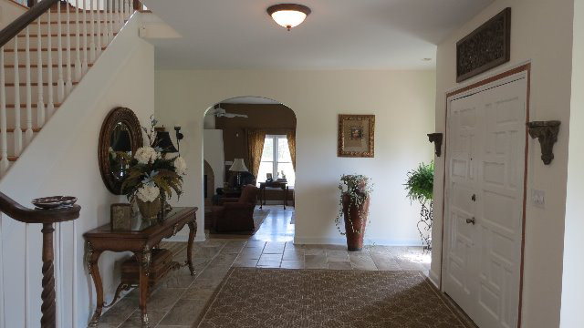 1143 Klopfer Road Macon, GA 31210 - Photo 3 of 19 a view of entryway and hall with wooden floor
