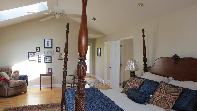 1143 Klopfer Road Macon, GA 31210 - Photo 10 of 19 a living room with furniture and a wooden floor