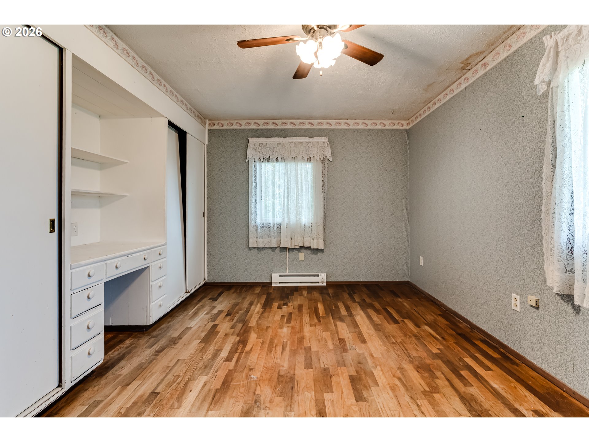 4076 North Street Springfield, OR 97478 - Photo 15 of 21 a view of an empty room with a window