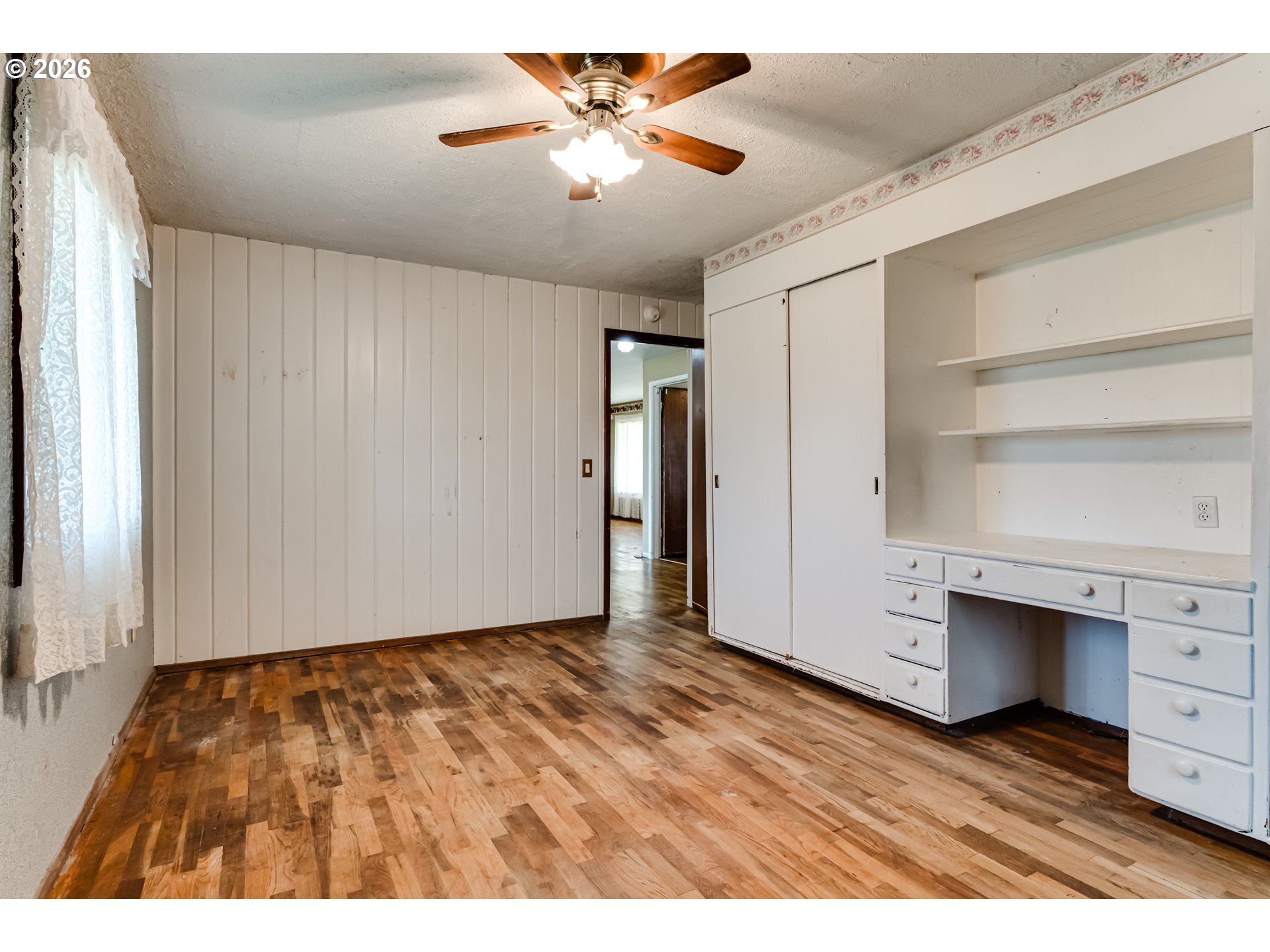 4076 North Street Springfield, OR 97478 - Photo 16 of 21 a view of room with hardwood floor and a ceiling fan