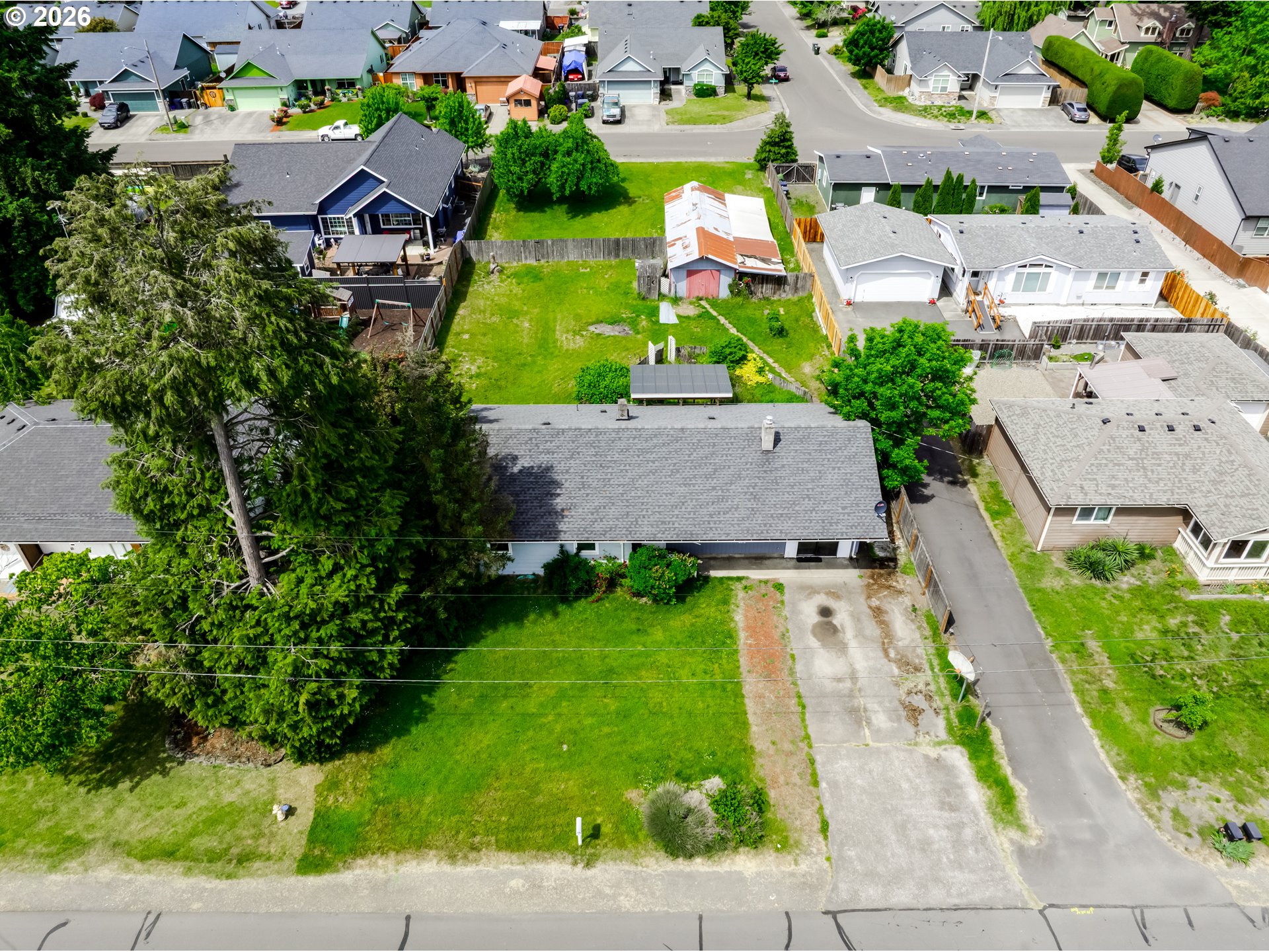 4076 North Street Springfield, OR 97478 - Photo 20 of 21 an aerial view of multiple houses with yard