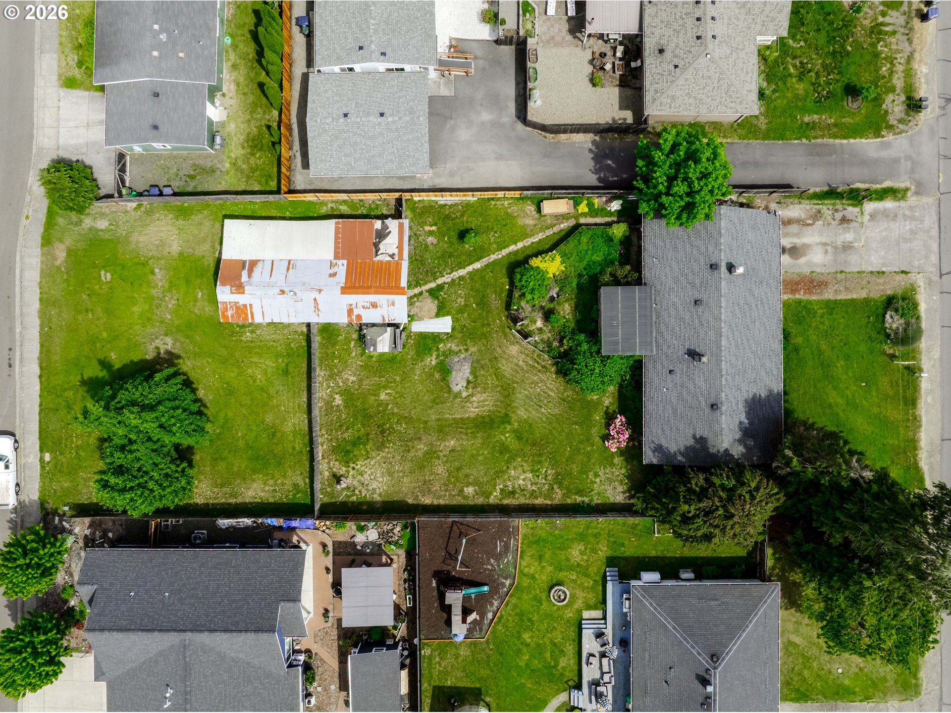 4076 North Street Springfield, OR 97478 - Photo 2 of 21 an aerial view of residential houses with outdoor space and street view