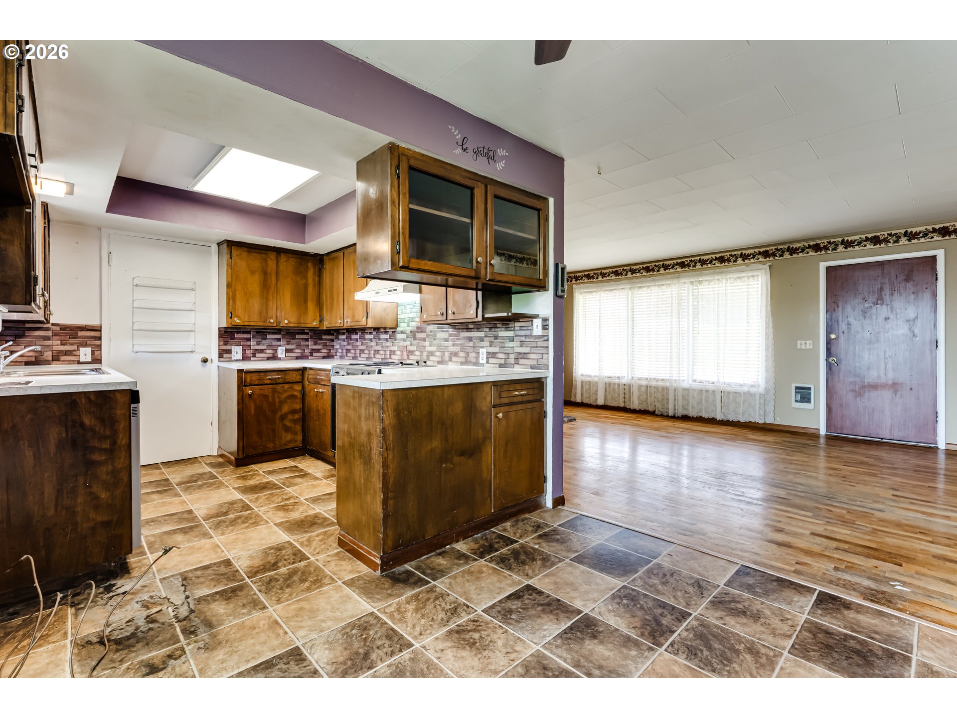 4076 North Street Springfield, OR 97478 - Photo 9 of 21 a kitchen with stainless steel appliances granite countertop a stove a sink and a refrigerator