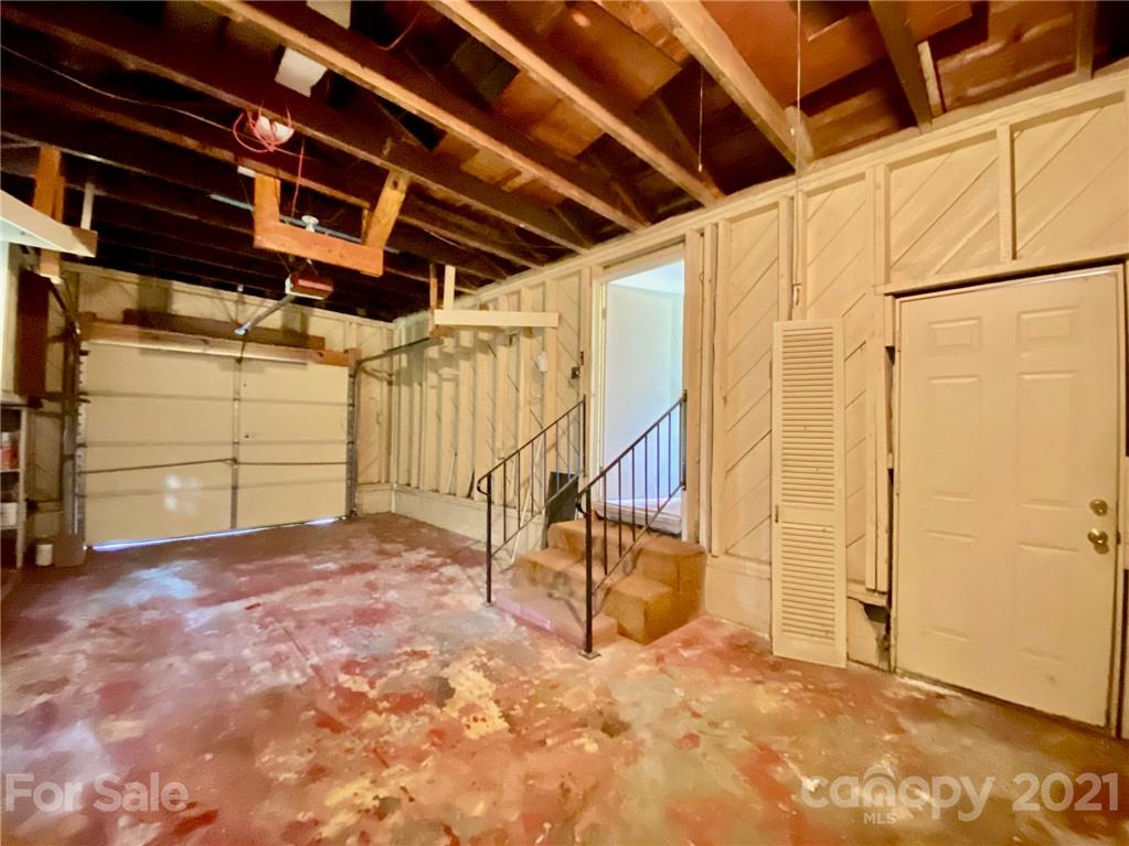 8930 Cool Springs Road Woodleaf, NC 27054 - Photo 17 of 42 a view of a room with wooden walls
