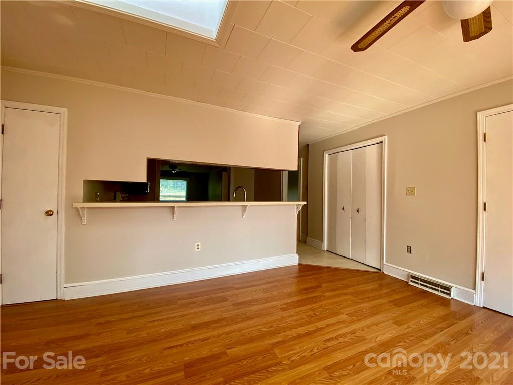 8930 Cool Springs Road Woodleaf, NC 27054 - Photo 27 of 42 a view of empty room with wooden floor