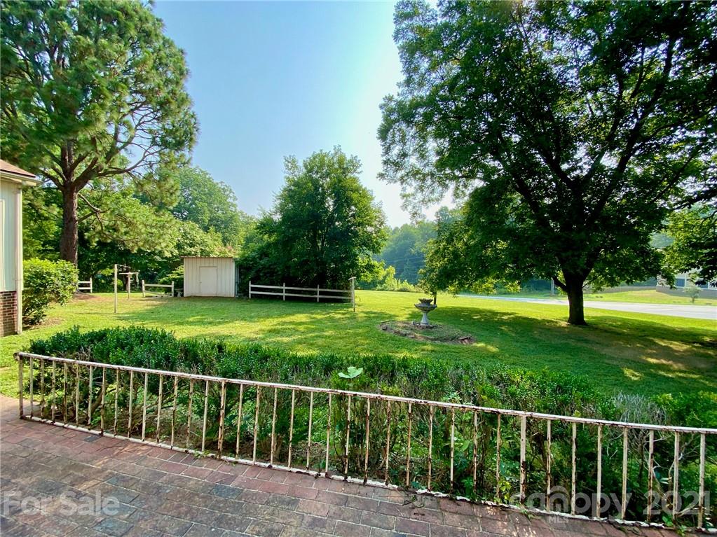 8930 Cool Springs Road Woodleaf, NC 27054 - Photo 40 of 42 a view of a yard with a large trees