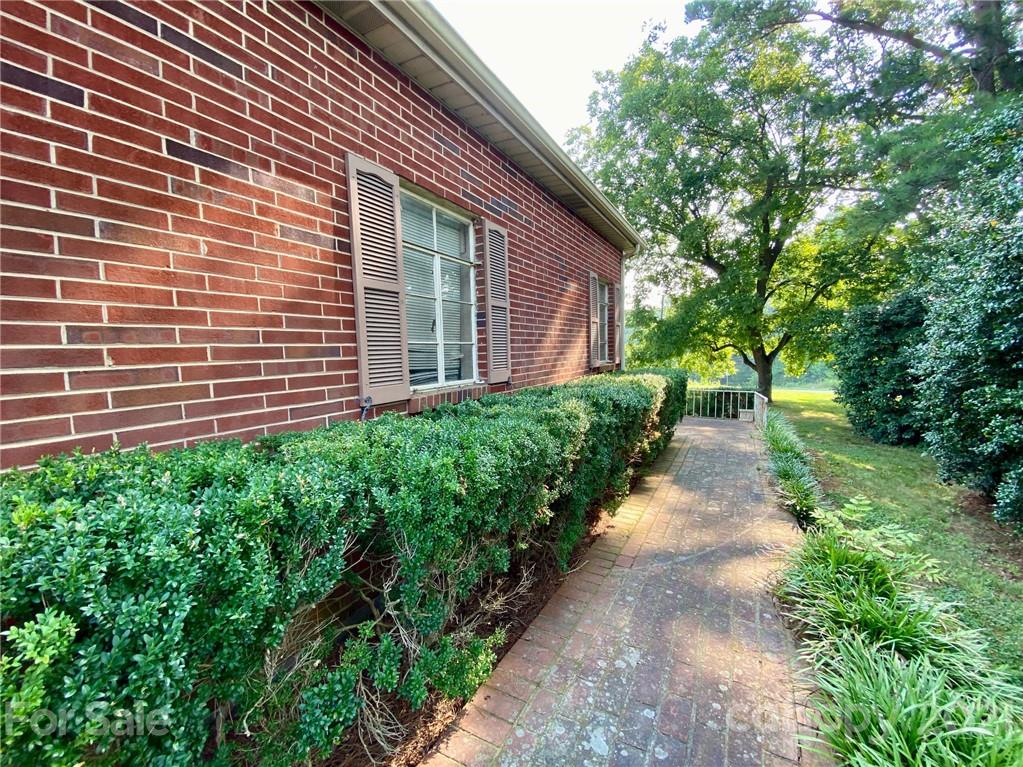 8930 Cool Springs Road Woodleaf, NC 27054 - Photo 41 of 42 a view of a pathway with a house