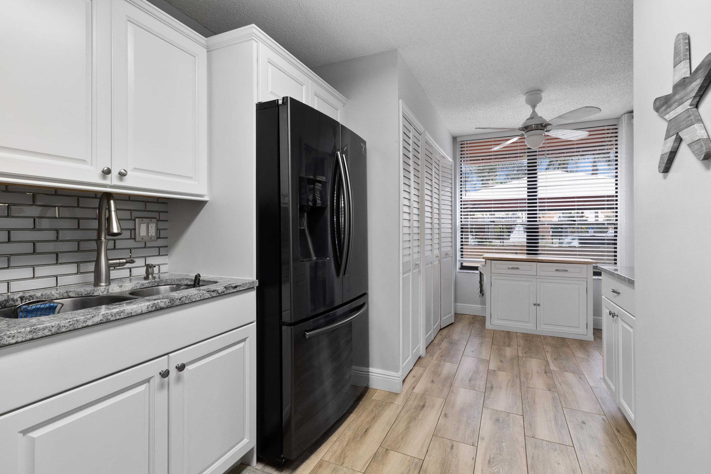 7225 Promenade 102 Drive, Unit 102 Boca Raton, FL 33433 - Photo 7 of 14 08_7225PromenadeDr_Unit102_2009_HiRes