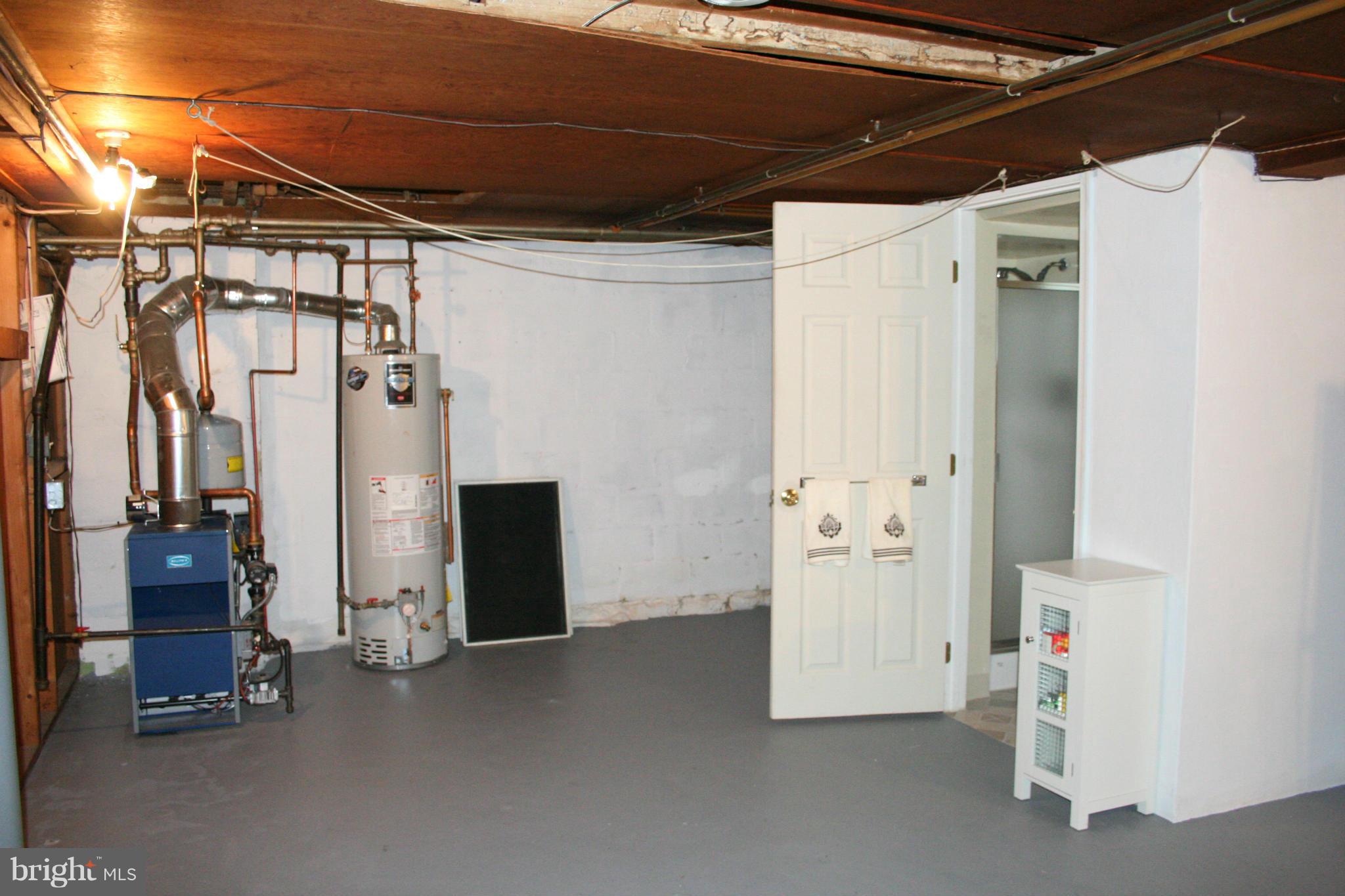 216 Dunkirk Road Baltimore, MD 21212 - Photo 14 of 21 a view of empty room with wooden walls