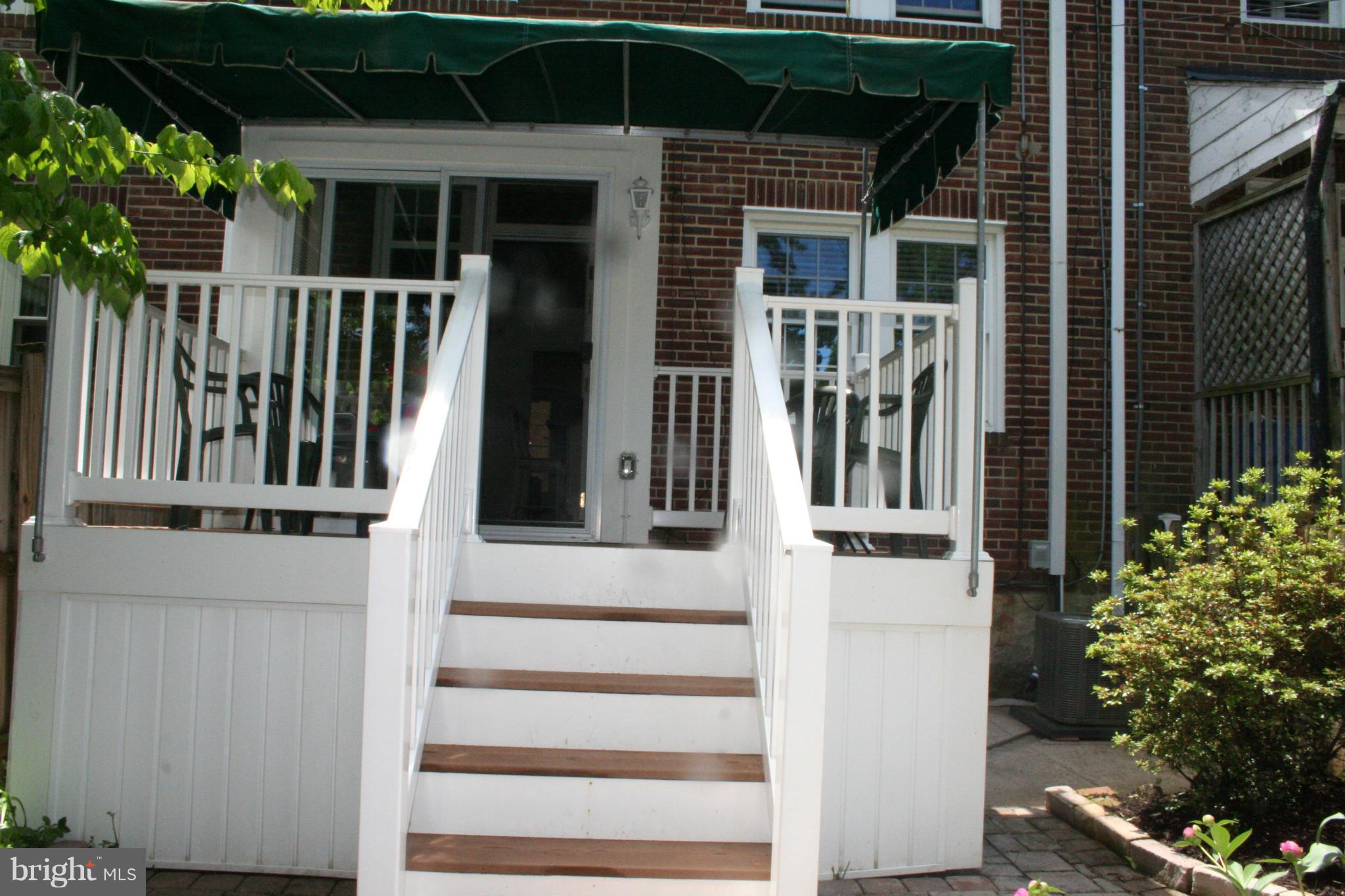 216 Dunkirk Road Baltimore, MD 21212 - Photo 20 of 21 a view of wooden house with a porch