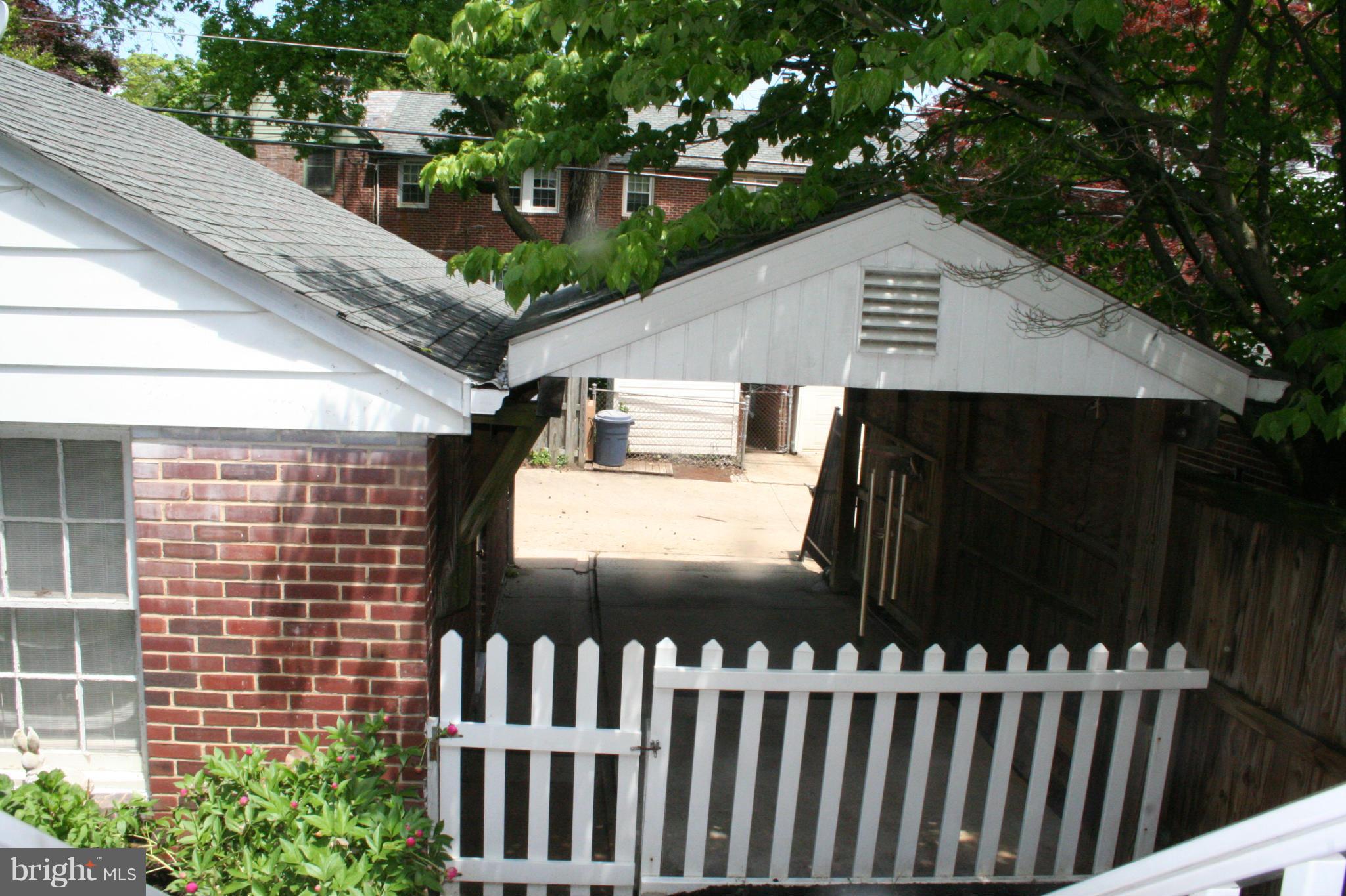 216 Dunkirk Road Baltimore, MD 21212 - Photo 21 of 21 a view of a house with a wooden deck