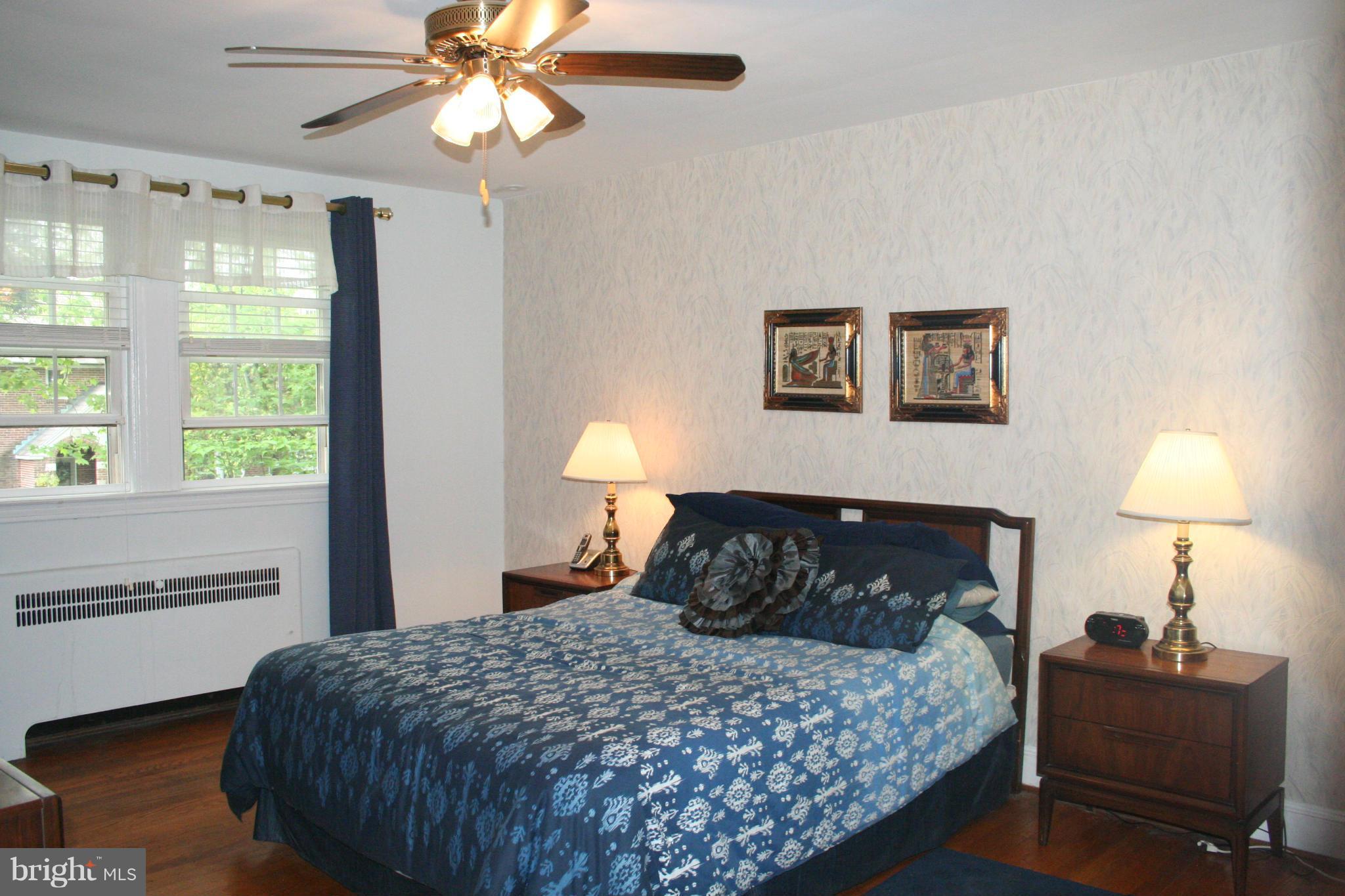 216 Dunkirk Road Baltimore, MD 21212 - Photo 7 of 21 a bedroom with a bed and a window
