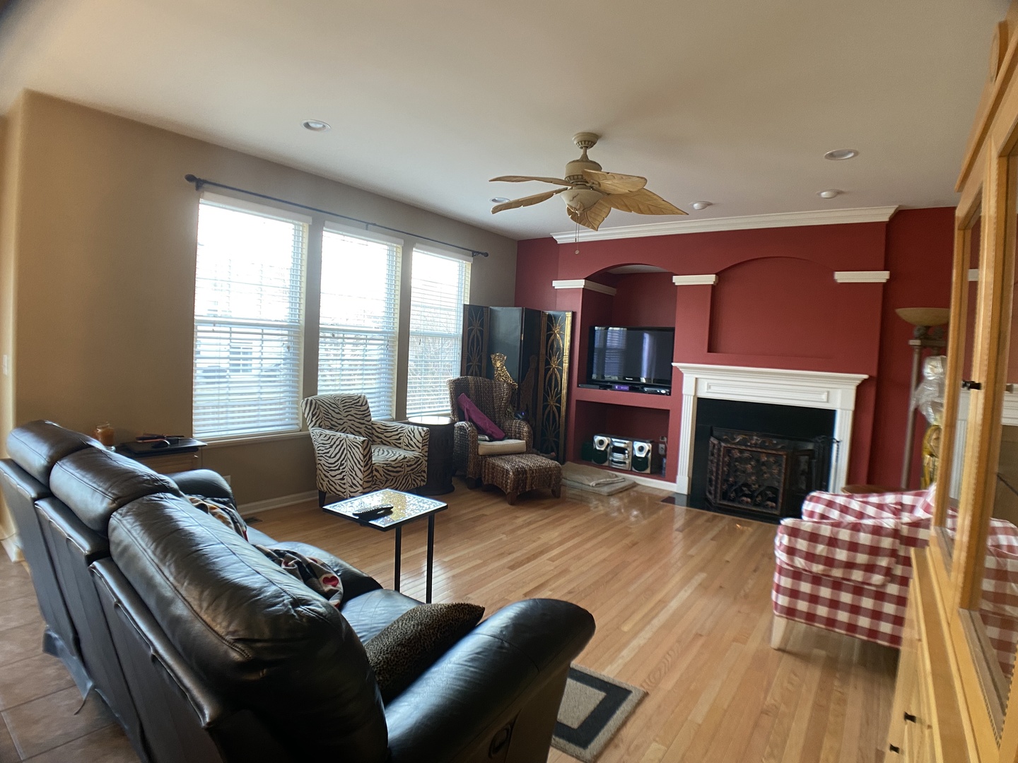 3029 Range Road Elgin, IL 60124 - Photo 3 of 20 a living room with furniture a fireplace and a large window