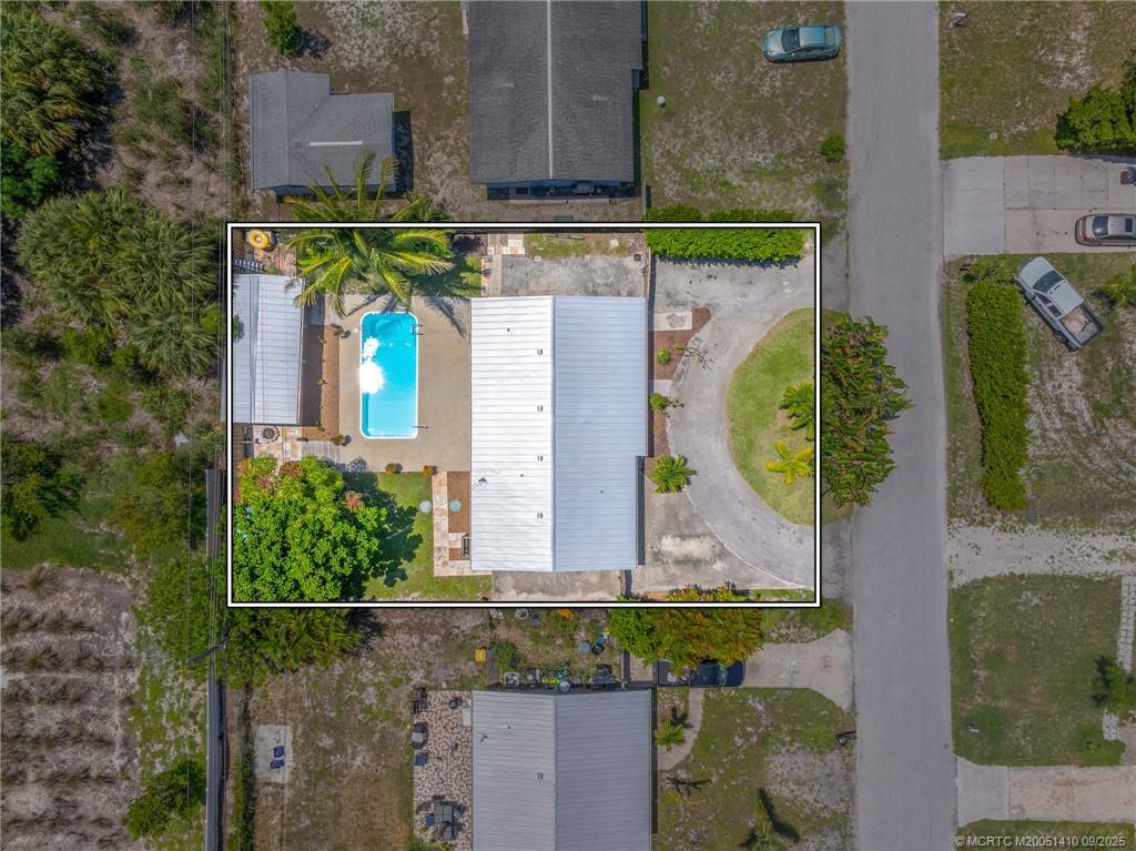2859 Northeast Hickory Ridge Avenue Jensen Beach, FL 34957 - Photo 29 of 32 a bird view of a house