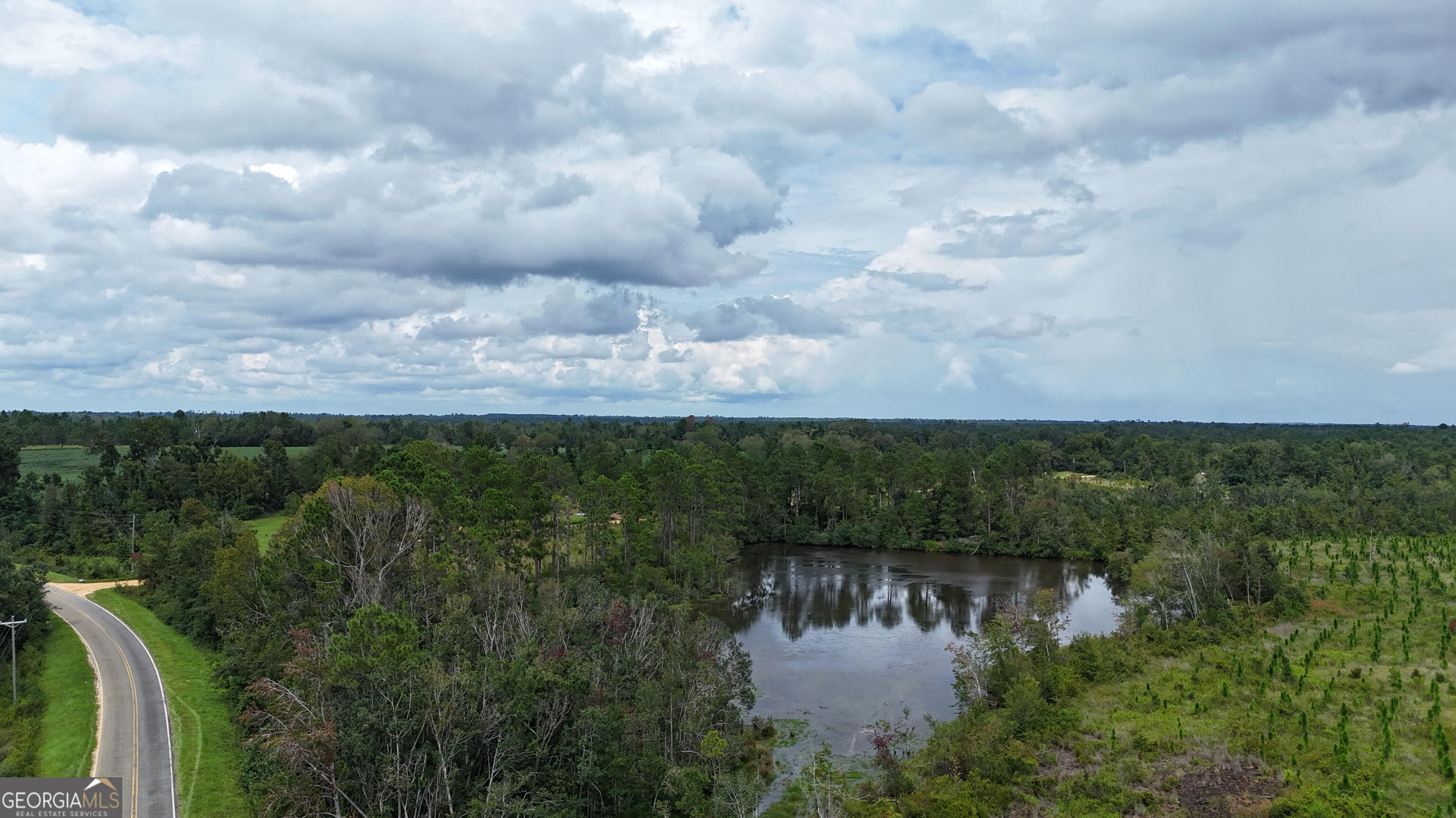 a view of a lake from a yard