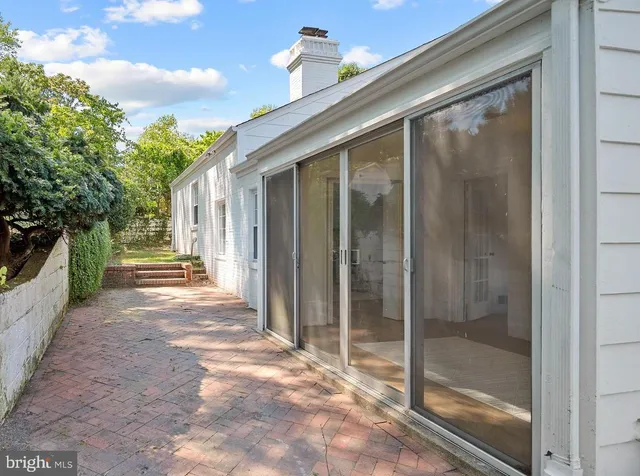 a view of a house with a glass door