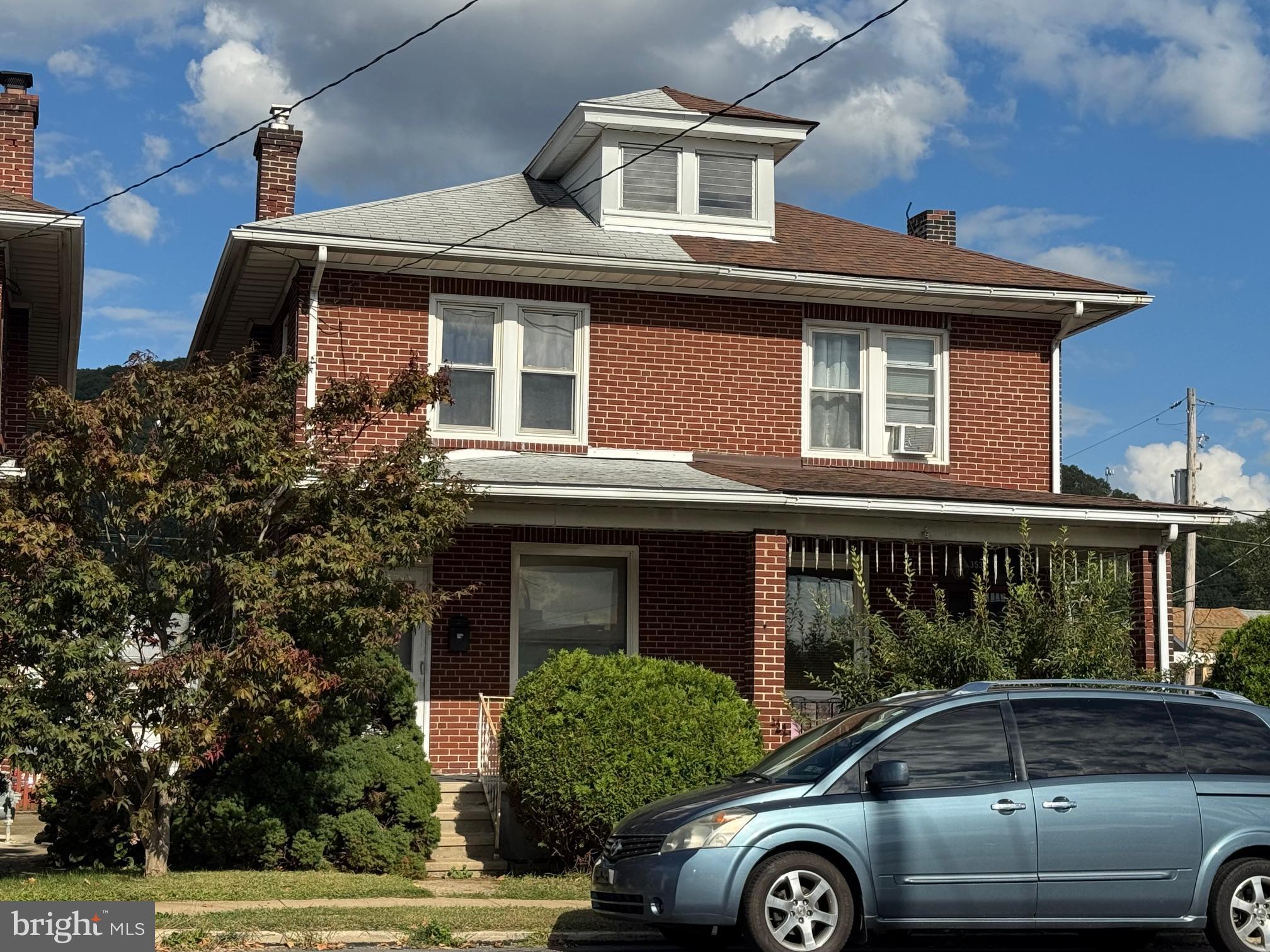 351 Morgantown Road Reading, PA 19611 - Photo 1 of 1 a front view of a house with parking area