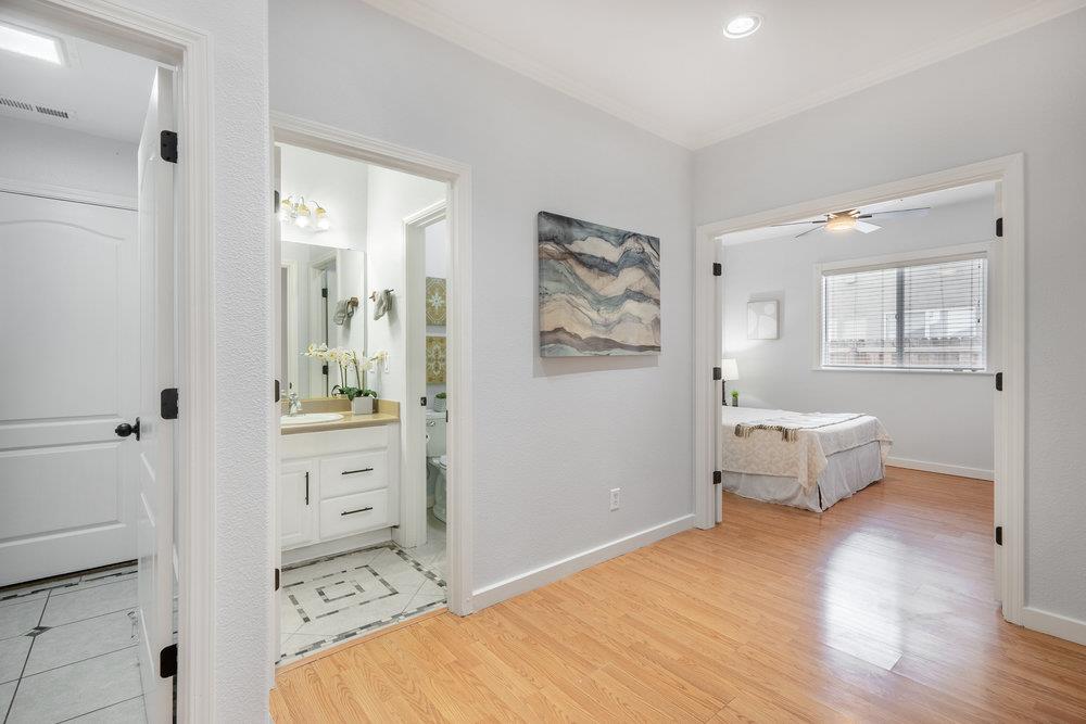 1120 Violet Way Gilroy, CA 95020 - Photo 14 of 39 a bedroom with a bed and wooden floor