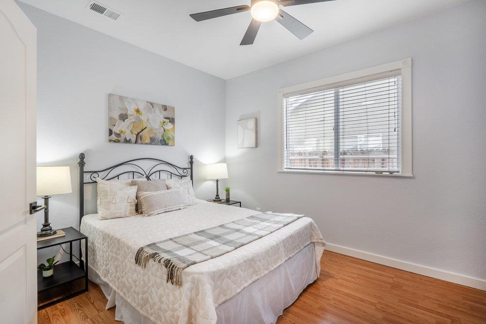 1120 Violet Way Gilroy, CA 95020 - Photo 15 of 39 a bedroom with a large bed and a window