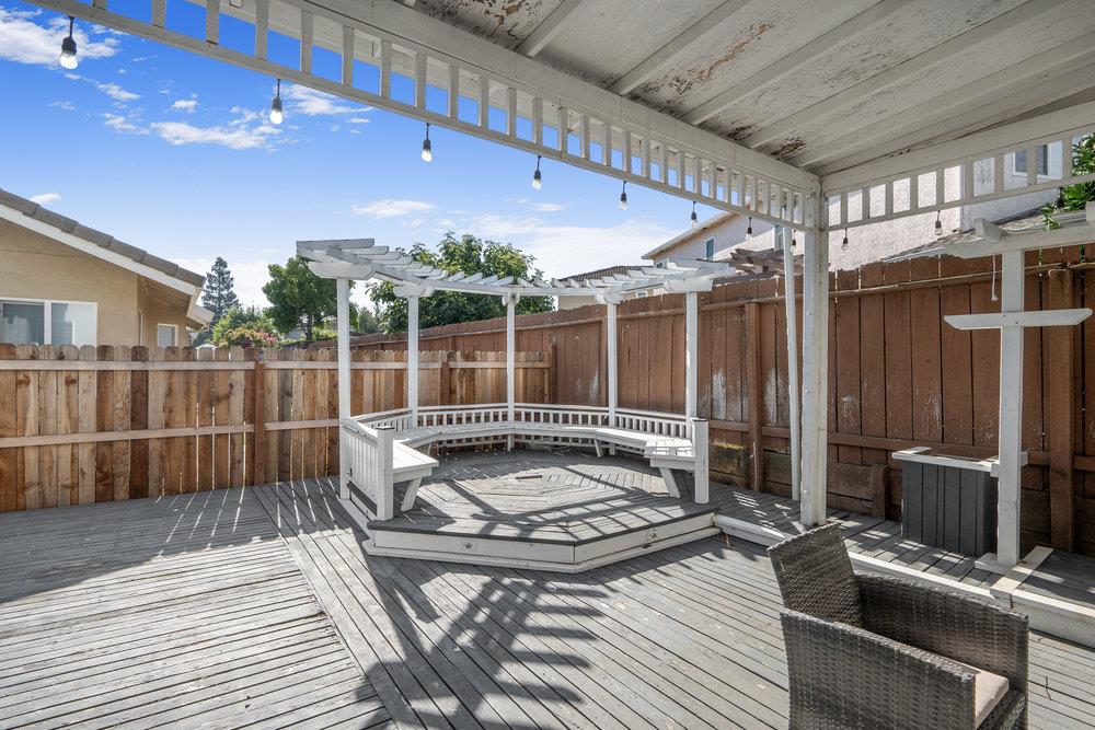 1120 Violet Way Gilroy, CA 95020 - Photo 34 of 39 a view of a balcony with wooden floor and iron fence