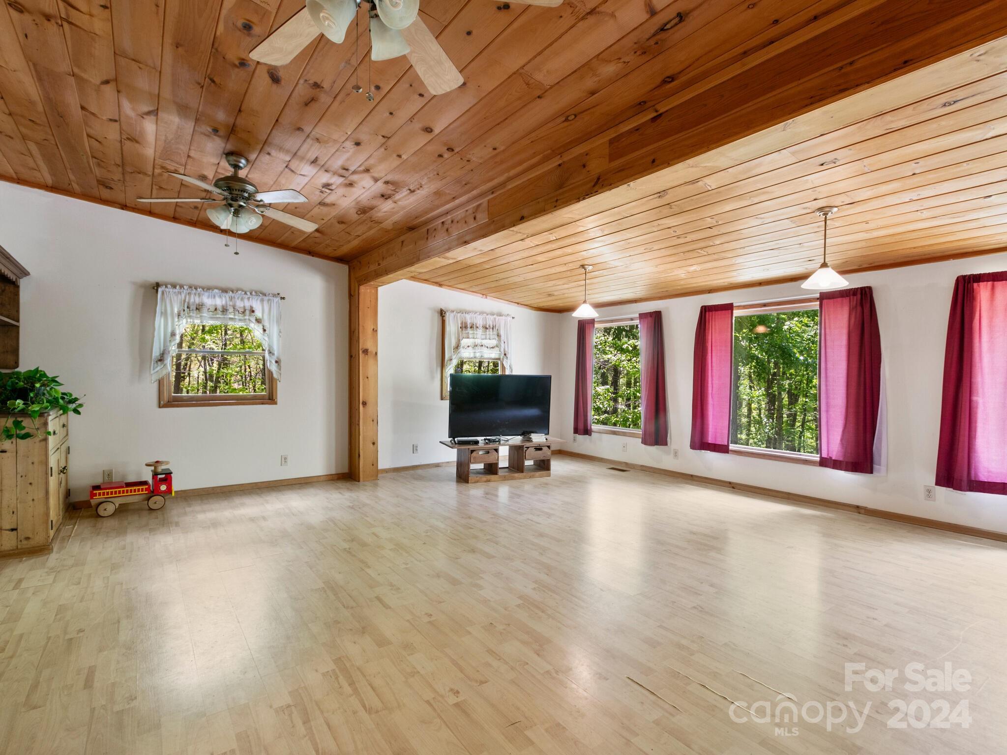 46 New Lite Road Fairview, NC 28730 - Photo 14 of 31 a view of a room with wooden floor and window