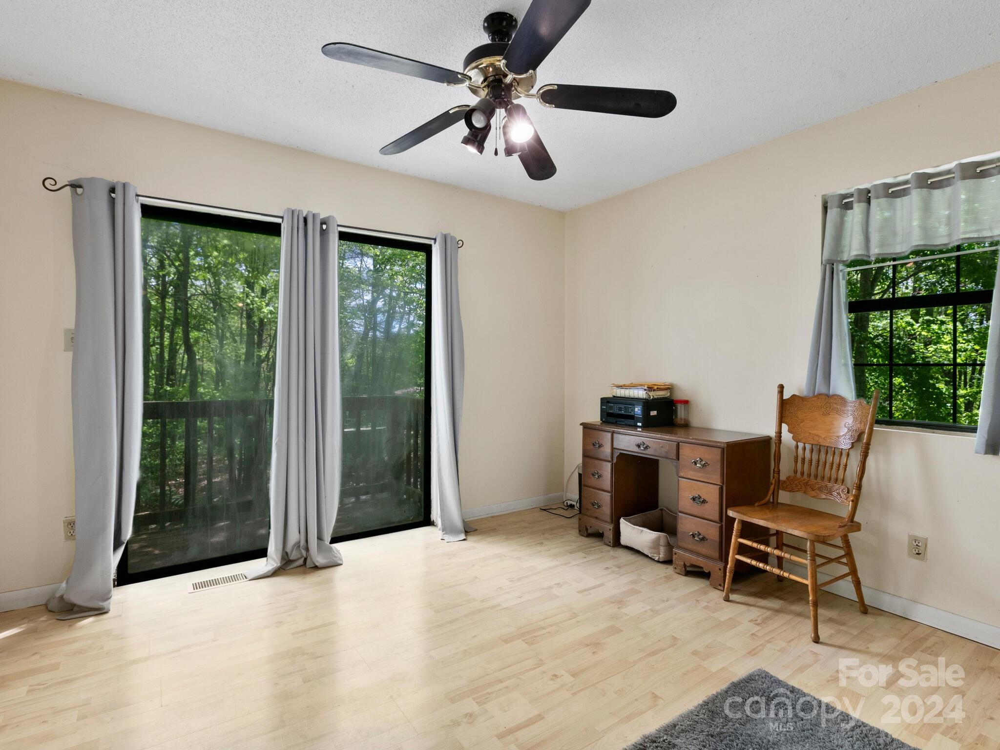 46 New Lite Road Fairview, NC 28730 - Photo 16 of 31 a workspace with furniture and a window